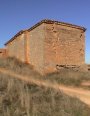 Cabecera, Canecillos, Cornisa, Nave y Portada ciega