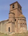 Ábside, Arco triunfal, Bóveda de cuarto de esfera, Capiteles interiores y Portada sur